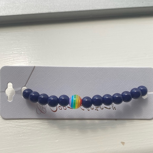 Blue beaded stretch bracelet with rainbow center bead. NWT - Picture 1 of 4